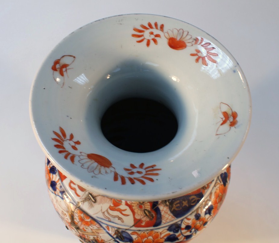 A 19thC Japanese Imari earthenware vase, floor standing with a squat trumpet stem and tapering - Image 2 of 5