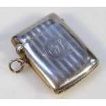 A George V silver vesta case, by W J Miatt & Co. the part engine turned oblong body centred with