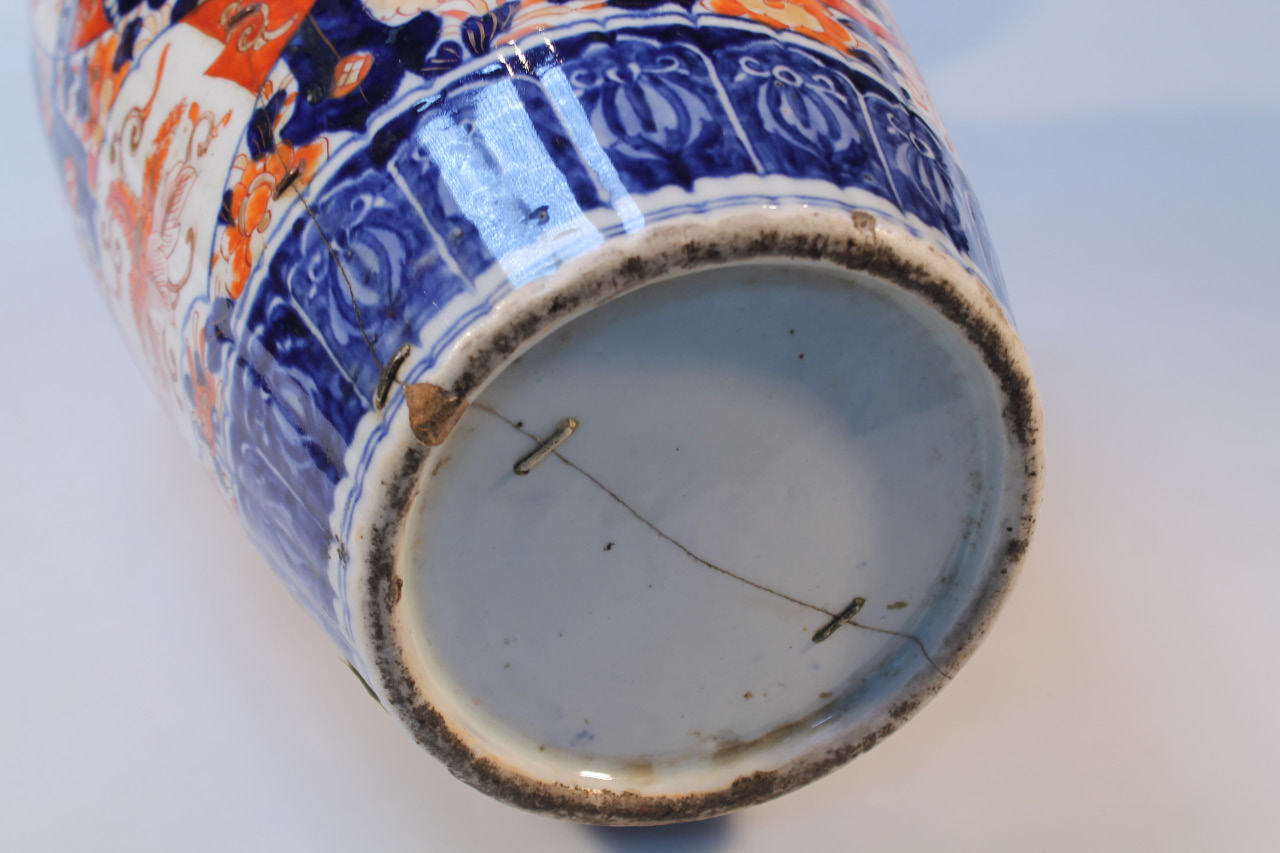 A 19thC Japanese Imari earthenware vase, floor standing with a squat trumpet stem and tapering - Image 4 of 5