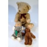 A 20thC brown plush Teddy bear, with articulated limbs and velvet finish pads, 40cm high, a Beanie