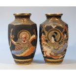 A pair of late 19thC Japanese satsuma pottery vases, each hexagonal body, hand painted and gilt