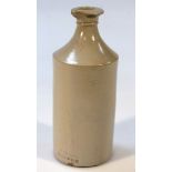 A late 19thC stoneware gin bottle, the plain shouldered body impressed Field London, 21cm high.