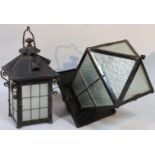 A street lamp lantern, with a frosted glass shade and meshwork border on a shaped base, 60cm high,