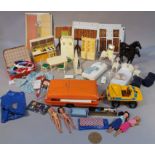 A quantity of Sindy dolls and accessories, to include caravan, car, tent, stable, horses, house
