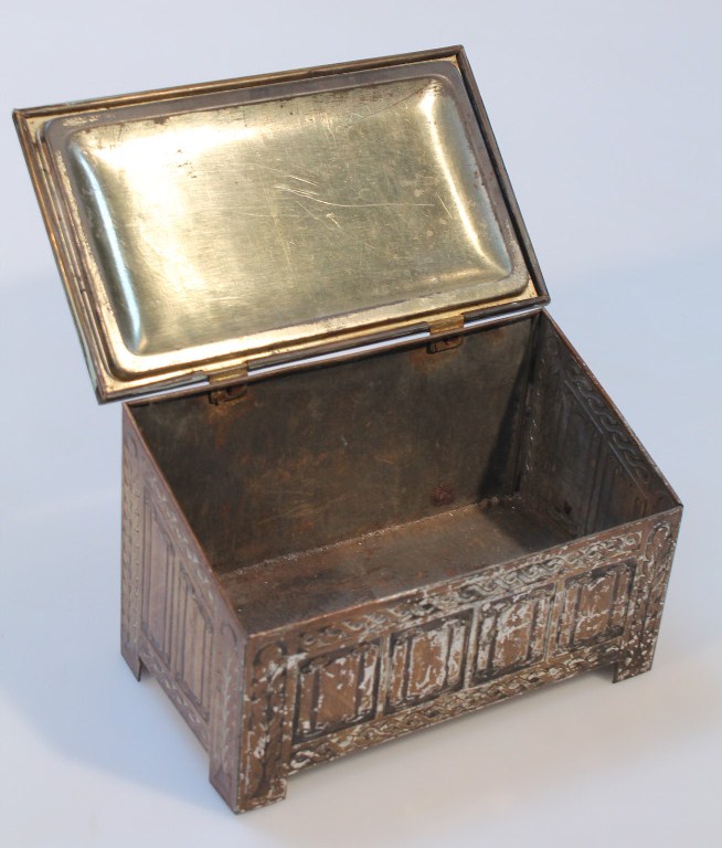 An early 20thC Jacob & Co. biscuit tin, in the form of a slipper box, the brass lid raised with - Image 2 of 3