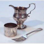 Various silver, comprising a helmet shaped cream jug with 'S' scroll handles, 9cm high, napkin ring,