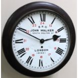 A 20thC BRS oak case railway clock, the 29cm dia. white metal dial marked John Walker South Molton