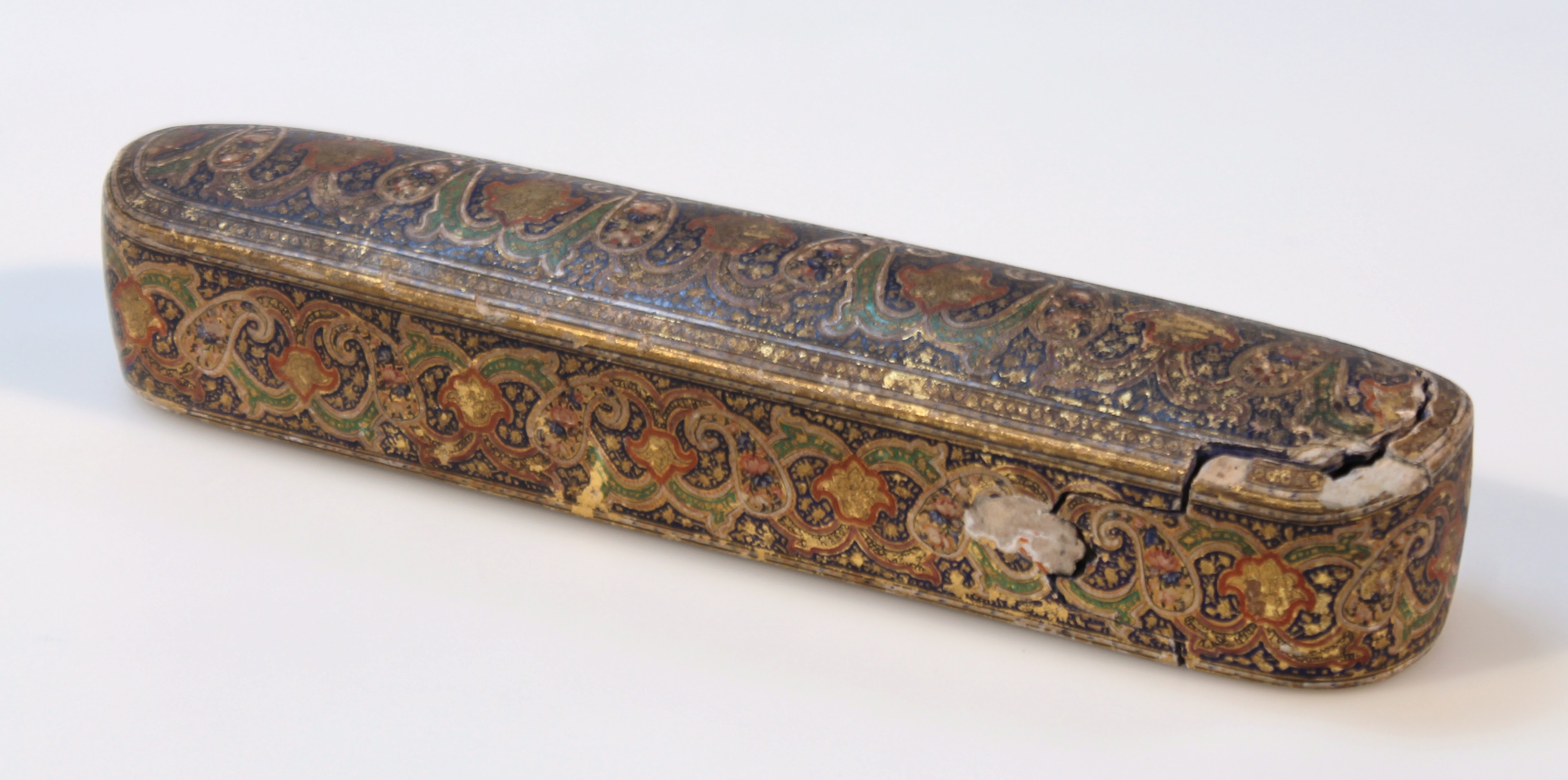 A 19thC papier mache box, the cylindrical body with an articulated pull out end revealing a plain