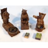 Three various hardwood Black Forest bears, to include an open salt with seated bear and right arm