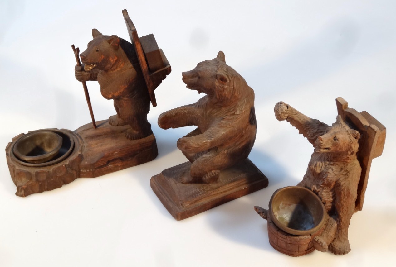 Three various hardwood Black Forest bears, to include an open salt with seated bear and right arm - Image 2 of 2
