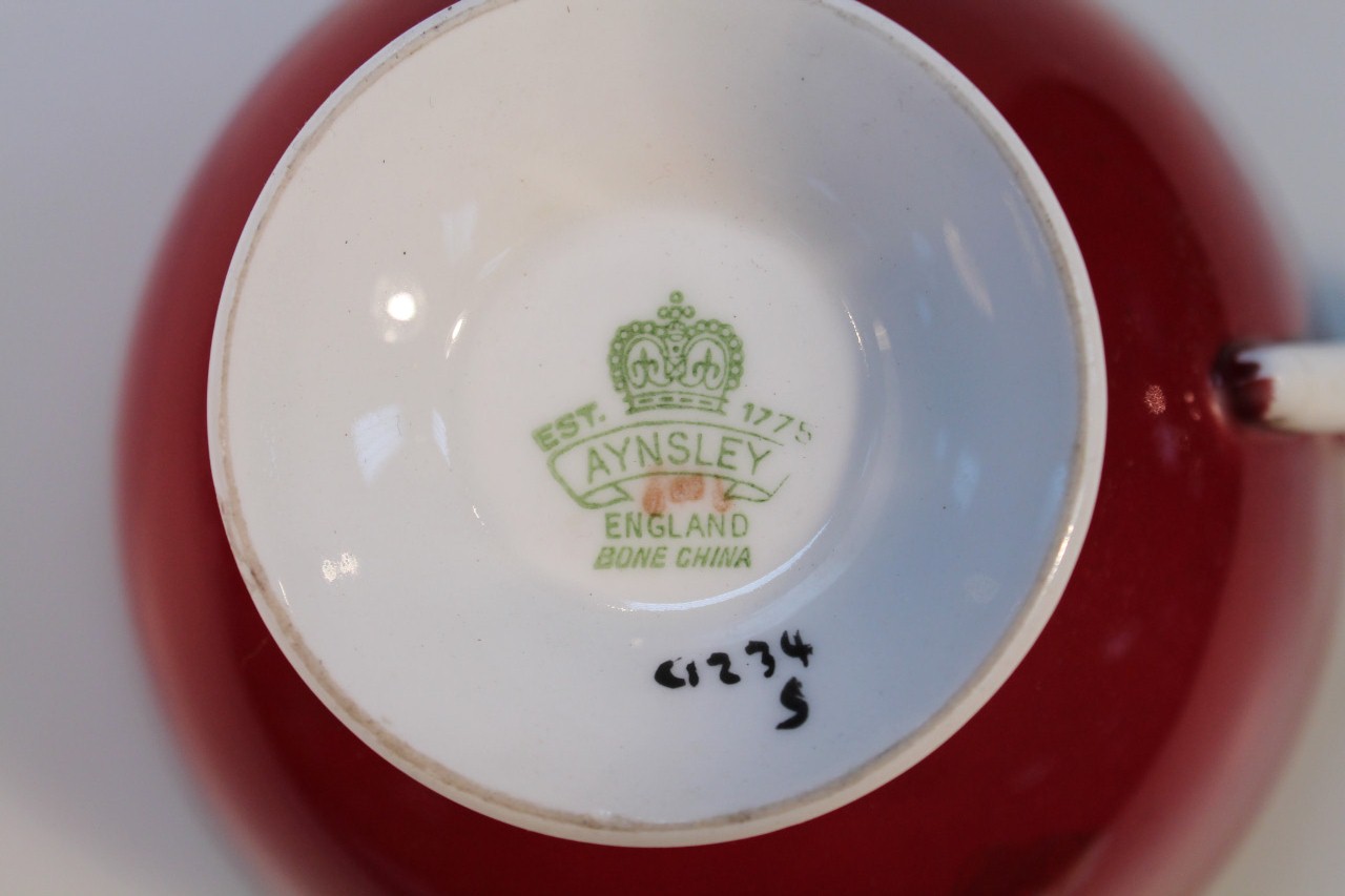 An Aynsley shipping cup and saucer, mainly decorated in brown with gilt highlights, printed marks - Image 3 of 3