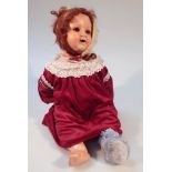 An early 20thC Koppelsdorf German semi-porcelain doll, no. 996, with fixed eyes, open mouth, no