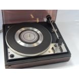 A Dual 1224 turntable.