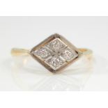 An Art Deco style ring, having four illusion set diamonds surrounded in white metal mount in