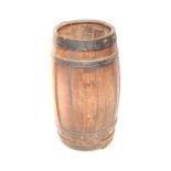 A coopered barrel fashioned into a stick stand, 67cm high.