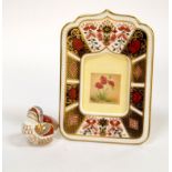 Royal Crown Derby, a photo frame, 1128 pattern and a Teal duckling paperweight, with gold