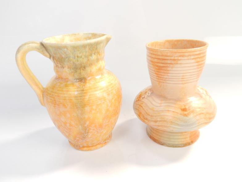 Two mid 20thC Beswick slipware style, comprising of one vase and one jug, pattern nos. 482 and 131.