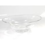 A Scandinavian design clear glass oval bowl, on circular base, 30cm dia.