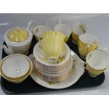 A Royal Albert part tea service, comprising teapot, cups, sugar bowl, milk jugs, serving plates,