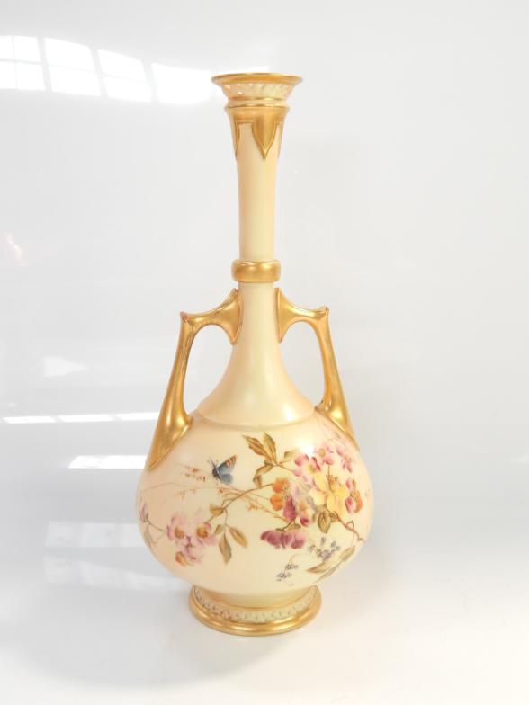 A Royal Worcester blush ivory baluster vase, with gilt mounts and floriate decoration, model no.