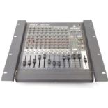 A Peavey RQ3014 compact mixing console, with rack mount ears.