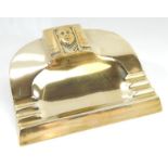 An Art Deco gilt bronze ink standish, having lifting flap of female form incorporating pen stand,