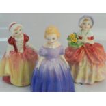 Three Royal Doulton figurines, comprising Dinky Do (HN2120), Cissie (HN1809) and Marie (HN1370),