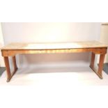 A pine work bench or table, 230cm wide.