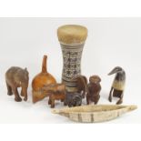 Carved hardwood and horn souvenir African animals, and others and a wooden cudgel, gourd pod and a