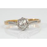 A diamond solitaire ring, with old mine cut stone in white metal crown setting, approx .35ct, in