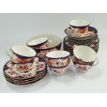 A Crown Staffordshire part tea service, with Imari pattern decoration.