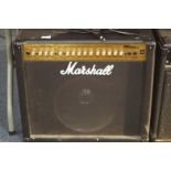 A Marshall MG series 100DFX guitar amplifier, with single 12" speaker and channel changing foot