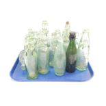 A collection of Lee and Green of Bourne Sleaford and Spalding glass bottles, (15).