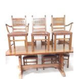 An oak refectory style table and set of six oak lime washed style dining chairs, with leatherette