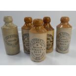 Five Lee and Green Limited ginger beer stoneware bottles, marked Lee and Green of Bourne, Sleaford