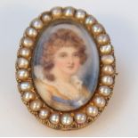 A late 19thC portrait pendant brooch, the oval body decorated with a miniature of a lady quarter