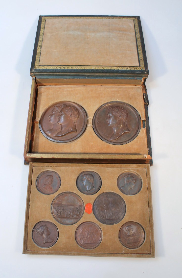 A cased set of 19thC French bronzed Napoleon related medallions, after designs by Andrieu, of - Image 2 of 4
