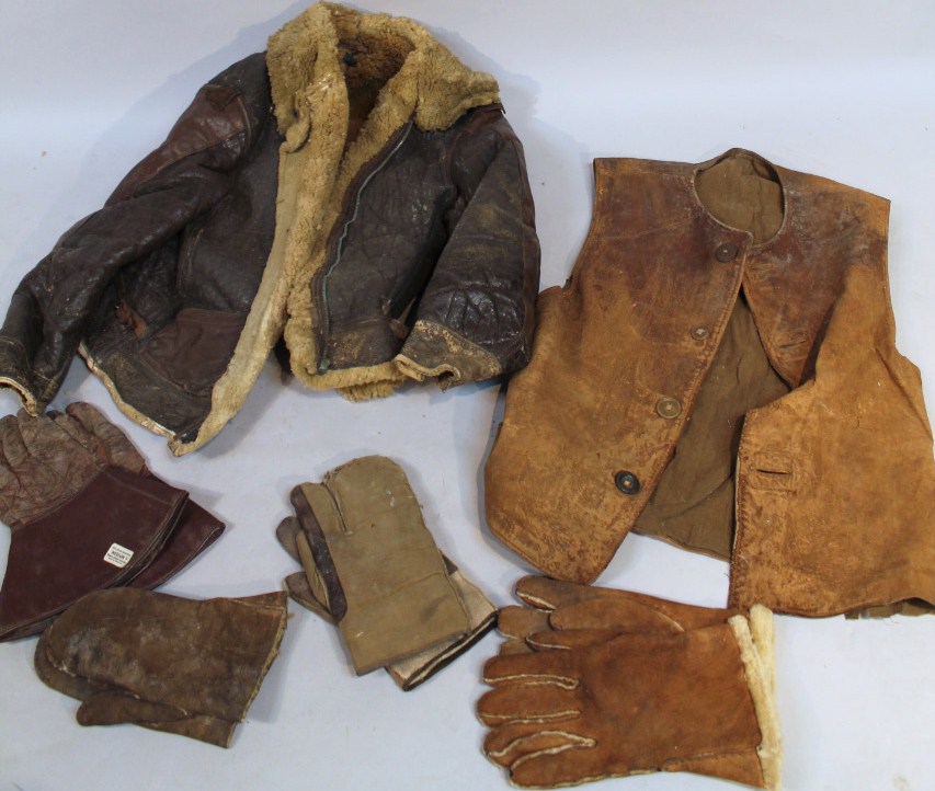 A mid-20thC RAF wool lined leather flying jacket, size 40R, a quantity of various gauntlets, other