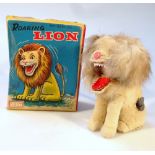 Withdrawn by Vendor pre-sale. A mid-20thC Japanese Alps mechanical Roaring Lion, 12cm high. (boxed)