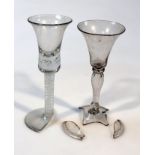 An 18thC ale glass, with plain bowl on teardrop stem, and domed foot, 15cm high, and another with