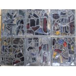 A quantity of 18thC lead framed stained glass panels, to include various religious scenes, figures