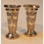 A pair of Victorian silver vases, by Jenkins & Timm, of tapering cylindrical form with flared