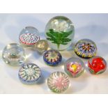 Various paperweights, to include a Murano glass floral example, 6cm high, others set with flowers,