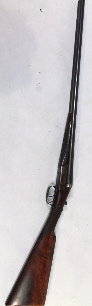 A Victoria 12 bore side by side shotgun, serial number 25237. Auctioneers note - Anyone wishing to