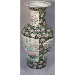 A 20thC famille vert floor standing vase, the shouldered circular body decorated with flowers,