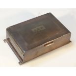 A 20thC silver cigarette case, the domed lid part engine turned hinging to reveal a cedar lined