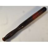 A Victorian ebonised oak truncheon, the moulded handle painted with a crown and heart with the