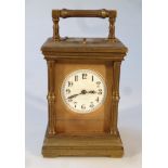 A late 19thC/early 20thC brass carriage set clock, of large proportion, the rectangular case, with