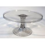 A late 19thC glass comport, the circular galleried top on a shaped stem, terminating in a domed