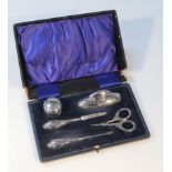 A George V silver travelling manicure set, by Boots Pure Drug Company, to include scissors, 9cm